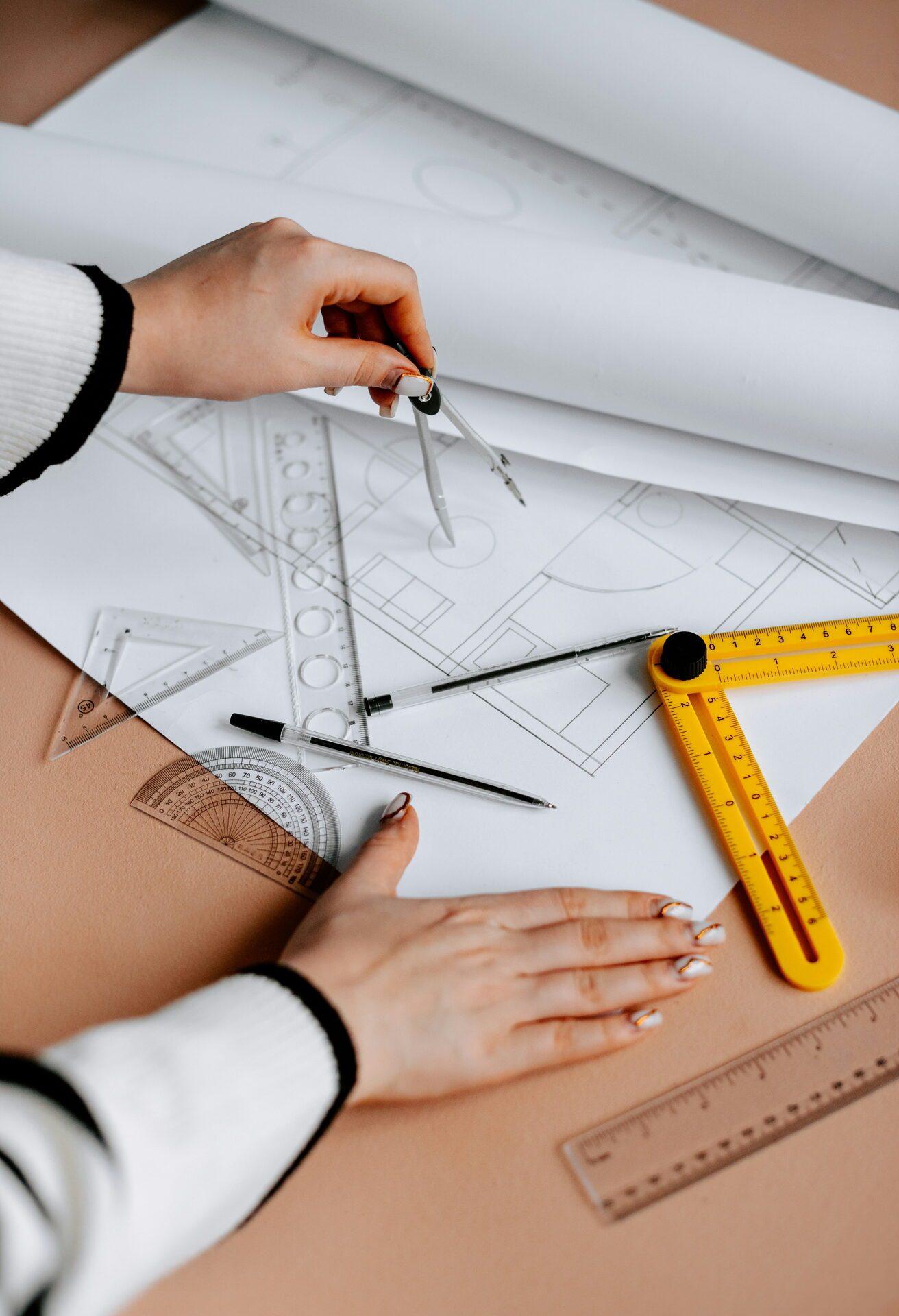 Architect reviewing drawings late at night